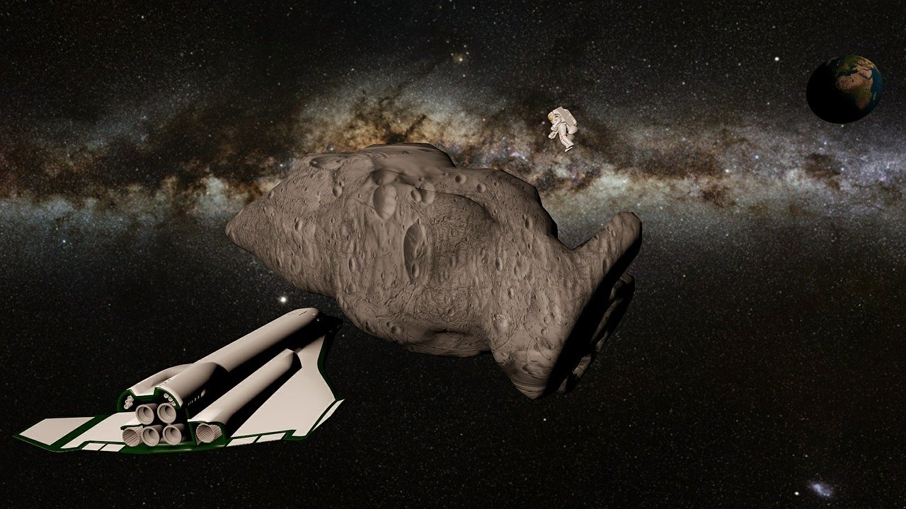 The Future of space discovery.  Astronaut on an asteroid.
